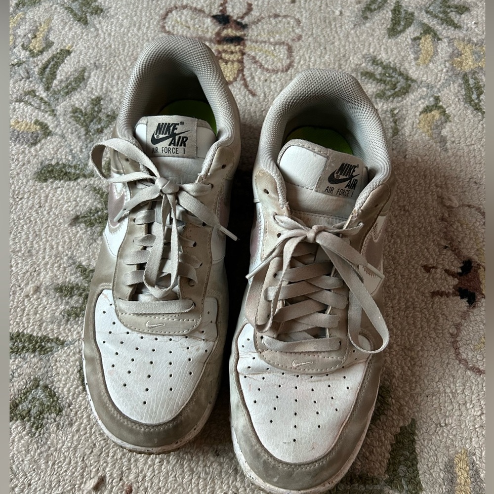 White and pink Nike sneakers